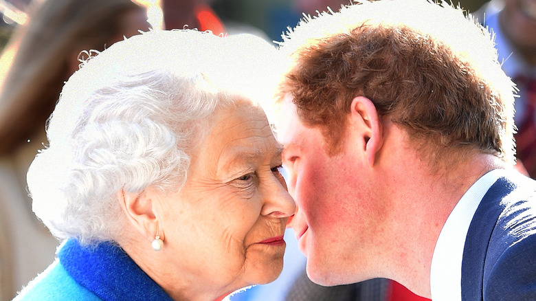 Prince Harry about to kiss Queen Elizabeth's cheek