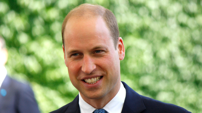 Prince William smiles