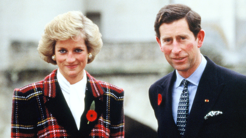Princess Diana posing with Prince Charles