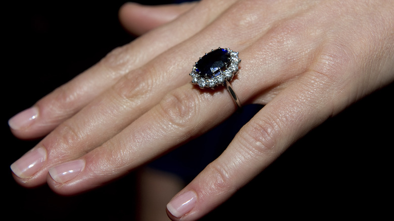 Kate Middleton's hand with sapphire engagement ring