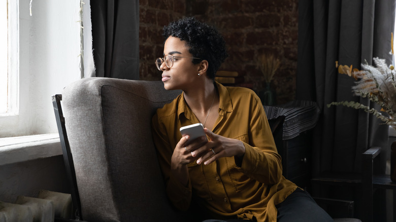 Woman looking out the window