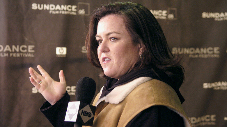 rosie odonnell speaking into microphone