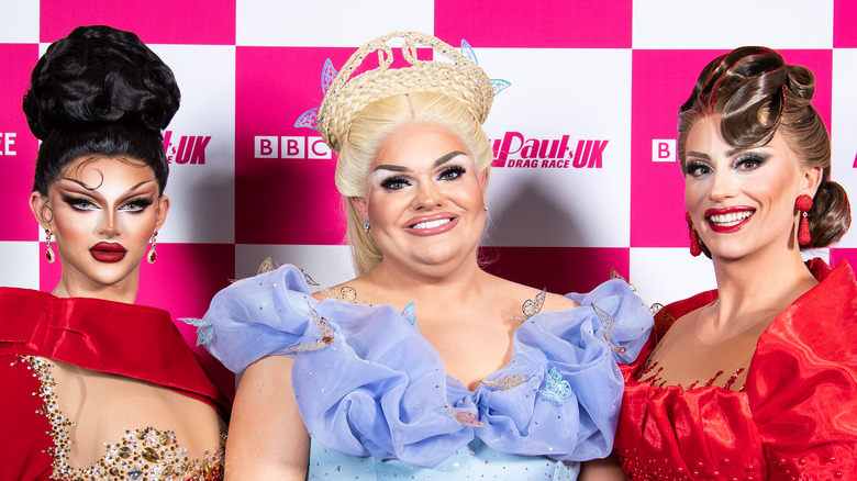 Drag Race UK finalists Krystal Versace, Kitty Scott-Claus and Ella Vaday pose together