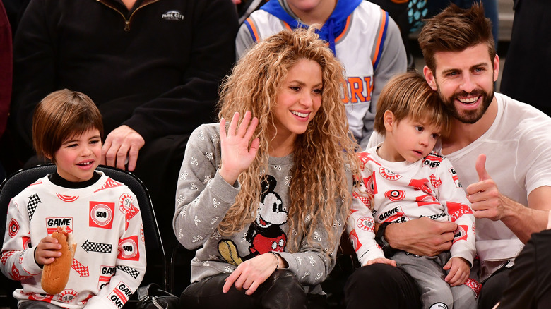 Shakira and then-boyfriend Gerard with their kids at a New York Knicks game