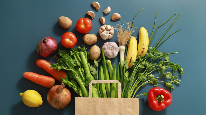 veggies coming out of shopping bag