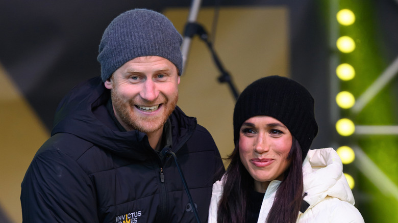 Prince Harry and Meghan Markle smiling