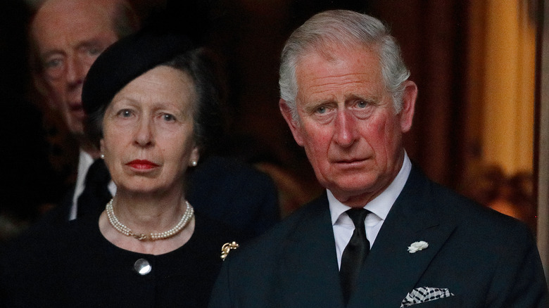 Princess Anne and Prince Charles at an event