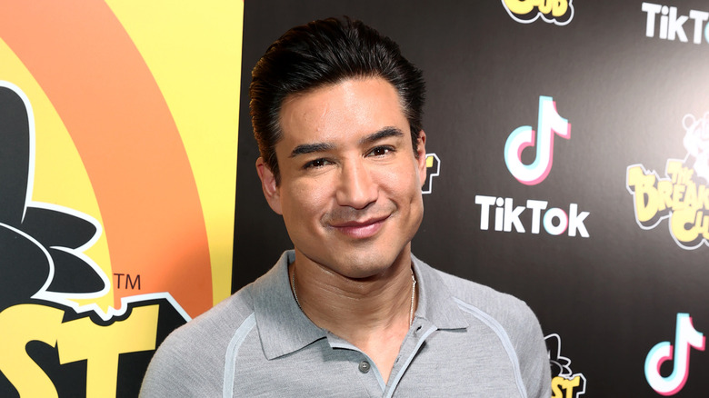 Mario Lopez smiling at an event