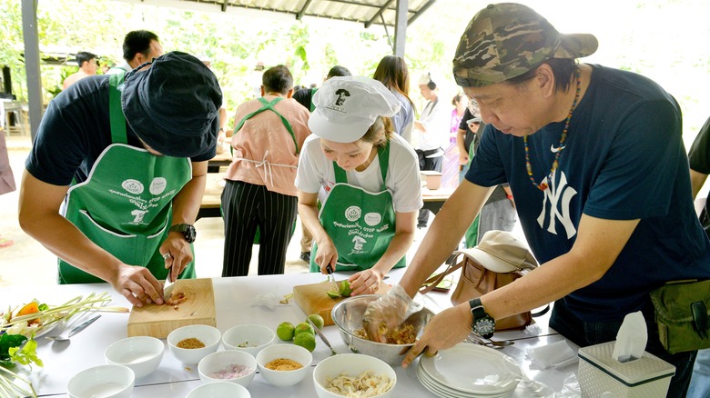 Tourists in a cooking class