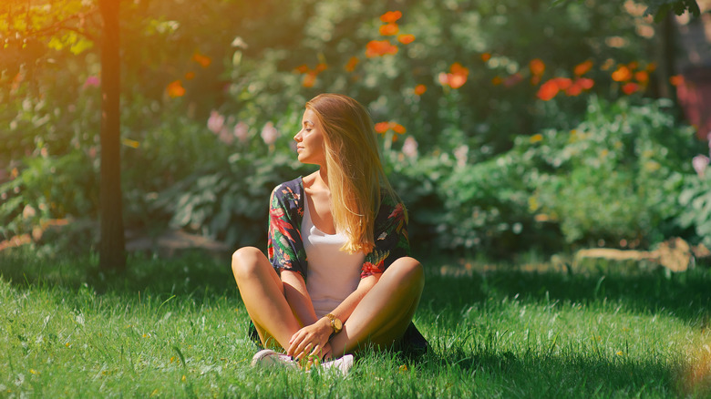 Woman sitting at park alone 