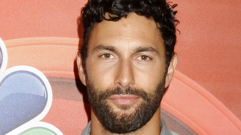 Noah Mills posing