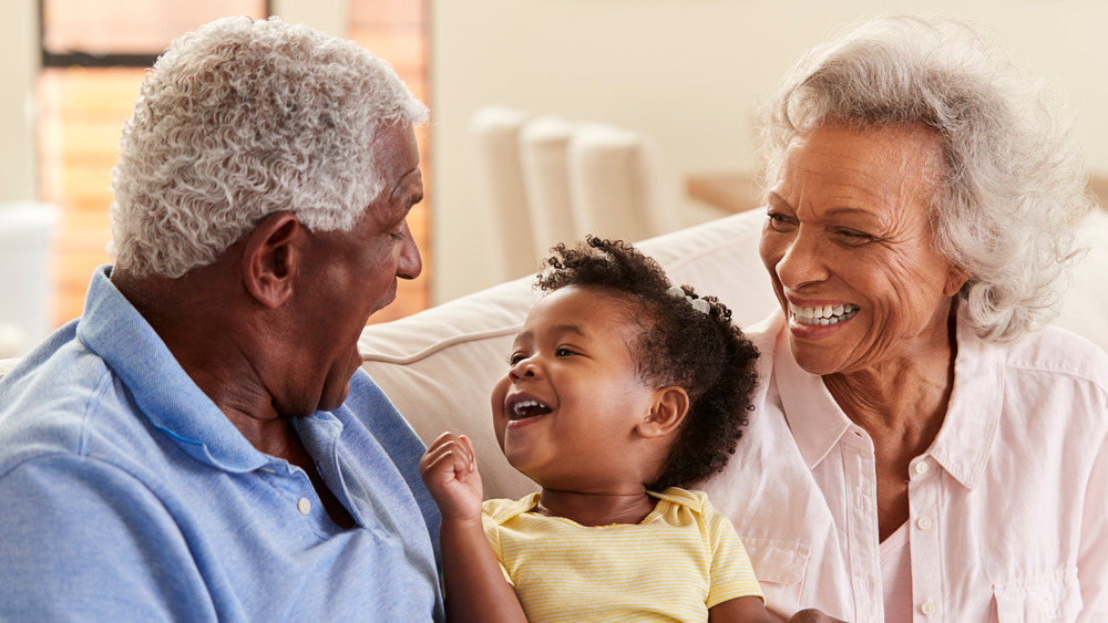 grandparents enjoying time with grandchild