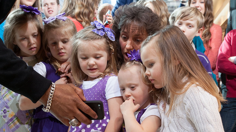 Michelle Duggar watching with daughters