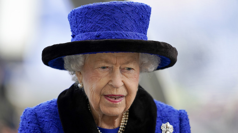 Queen Elizabeth thinking