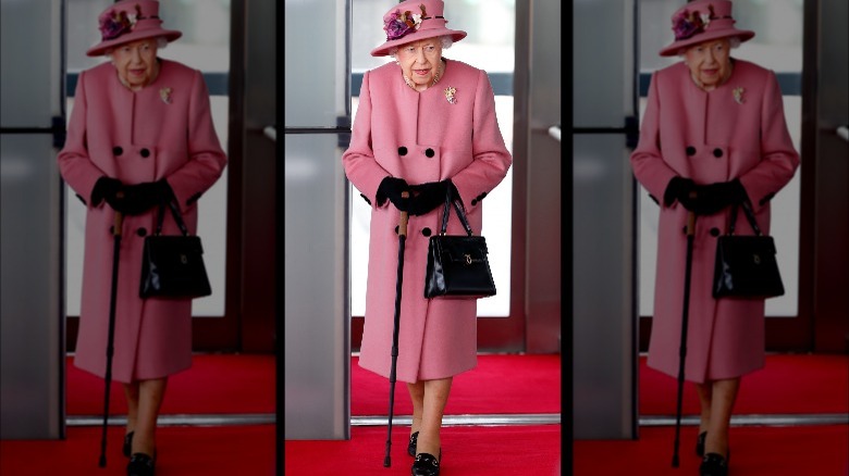 Queen Elizabeth using her walking stick