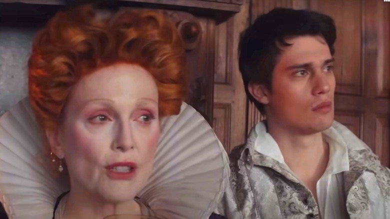 Nicholas Galitzineand Julianne Moore in period costumes in Mary & George