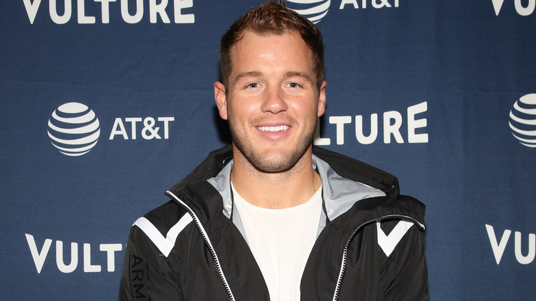 Colton Underwood poses on the red carpet