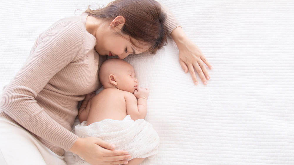 Mom and baby sleeping