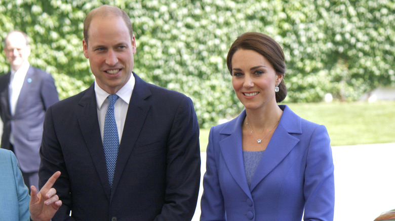 Prince William and Kate Middleton at an outdoor event