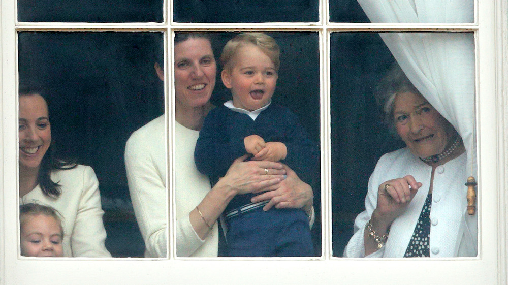 Cambridge's nanny holding Prince George