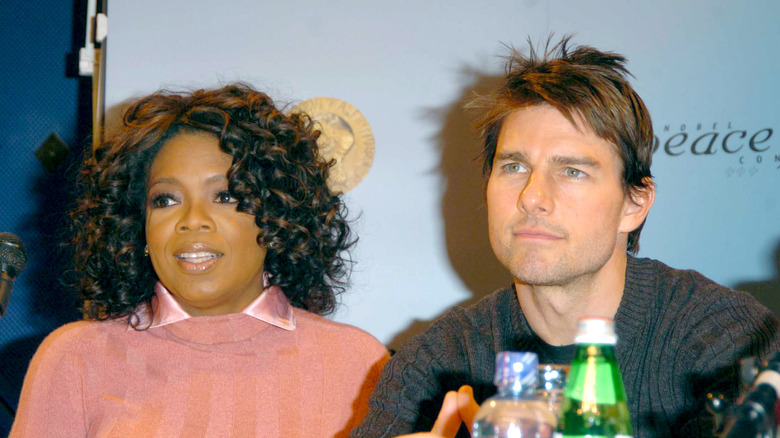 Tom Cruise and Oprah Winfrey at an event.