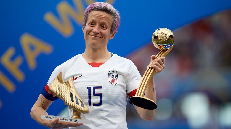 Megan Rapinoe with trophies