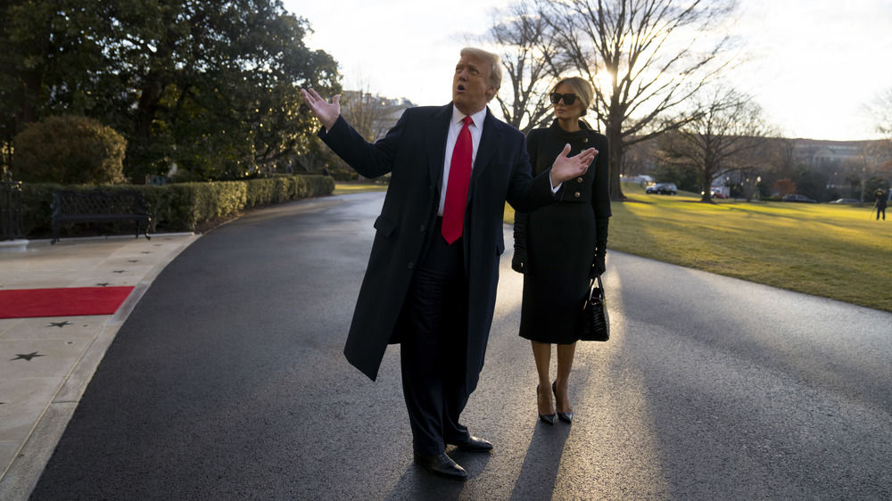 Donald and Melania Trump leave the White House