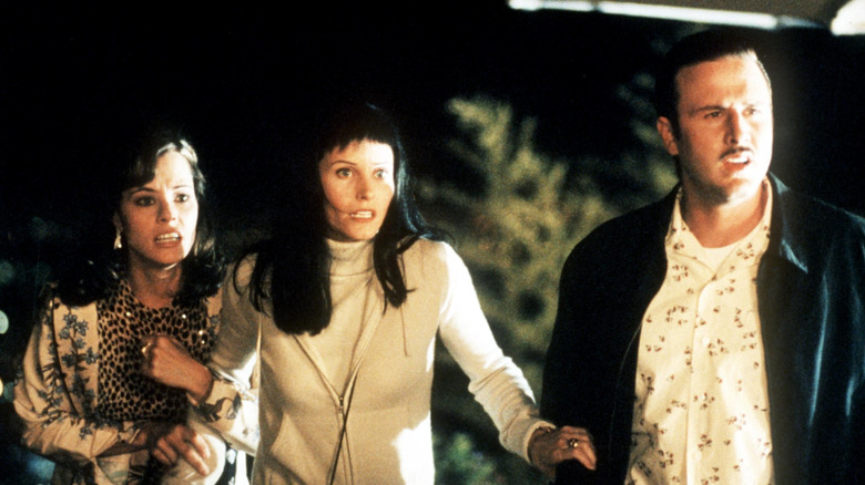 Parker Posey, Courteney Cox, and David Arquette in a scene from Scream 3