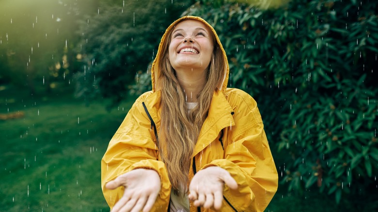 Woman in rain shower 