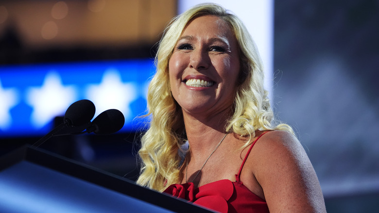 Marjorie Taylor Greene smiling podium RNC 2024