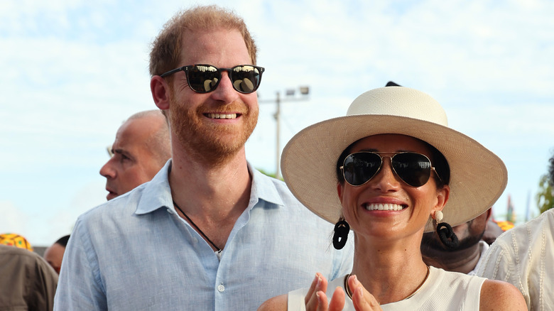 Meghan and Harry smiling during August 2024 Colombia visit