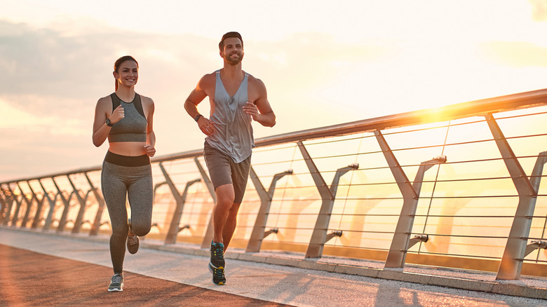 Two friends running together