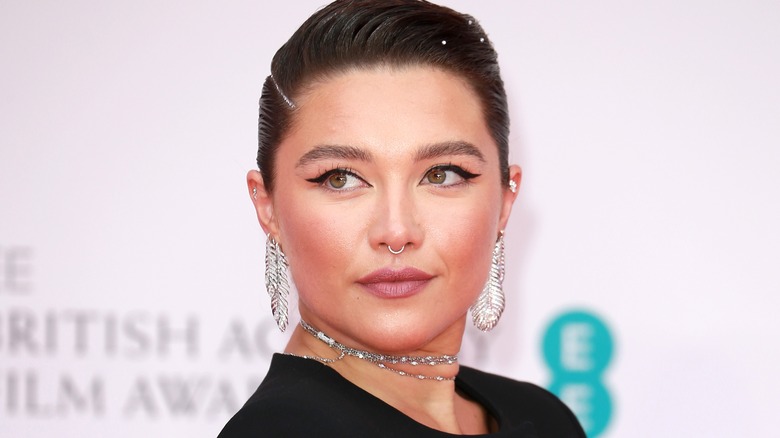 Florence Pugh posing at BAFTAs