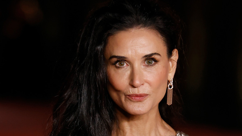 Demi Moore gazing intently into camera