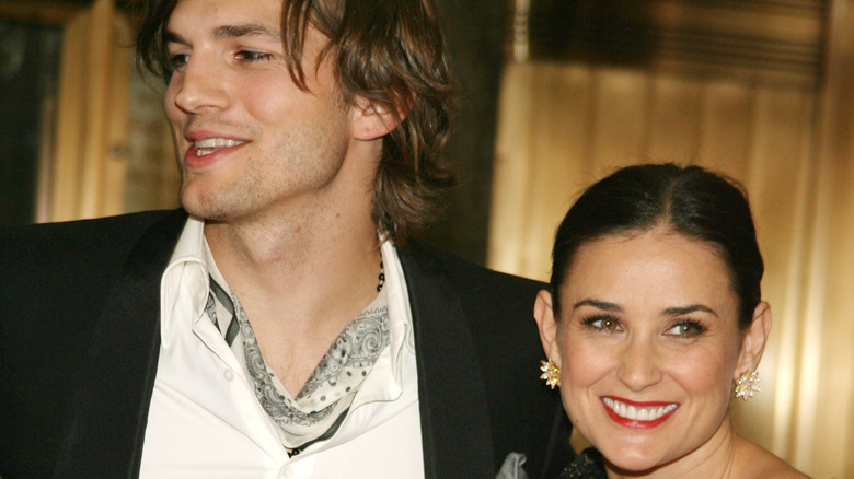 Ashton Kutcher and Demi Moore smiling