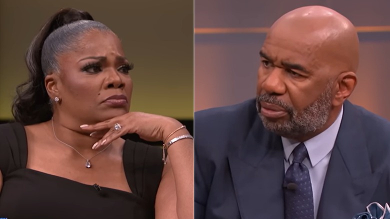 Mo'Nique frowning and Steve Harvey frowning