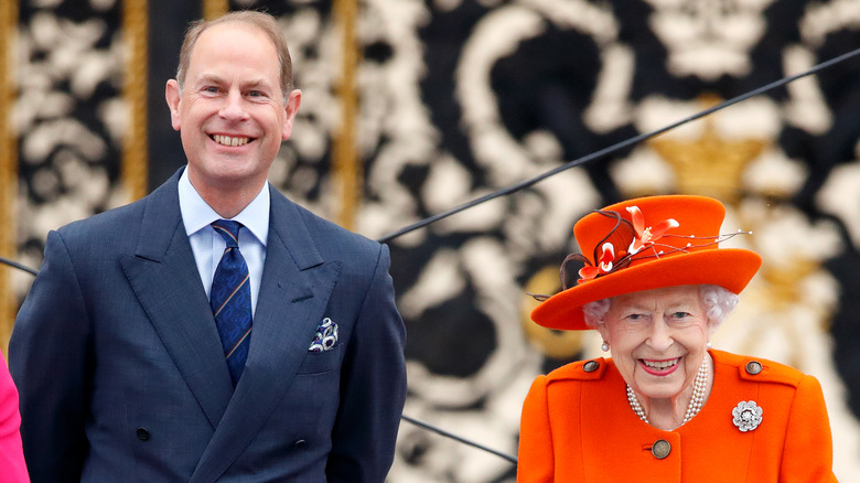 Prince Edward posing with Queen Elizabeth