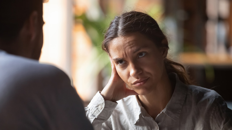 woman has skeptical conversation