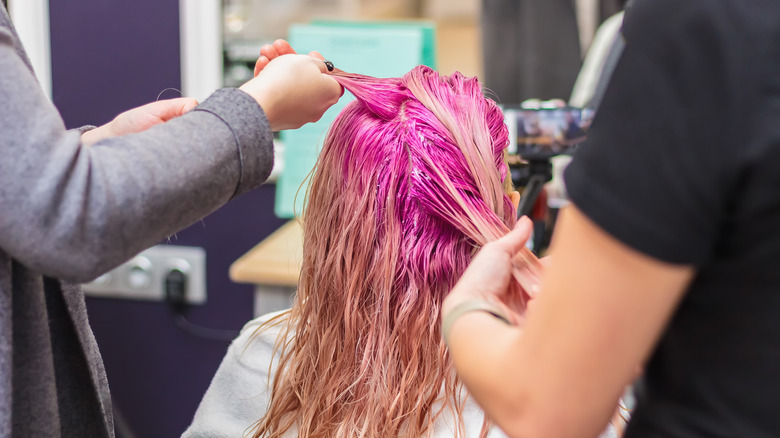 adding bright pink dye to hair