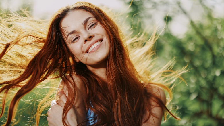 woman with dyed red hair