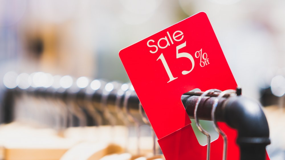 Sale sign on a store rack