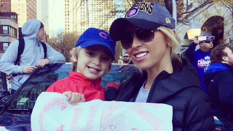Giuliana Rancic and son Duke cheering for Chicago Cubs
