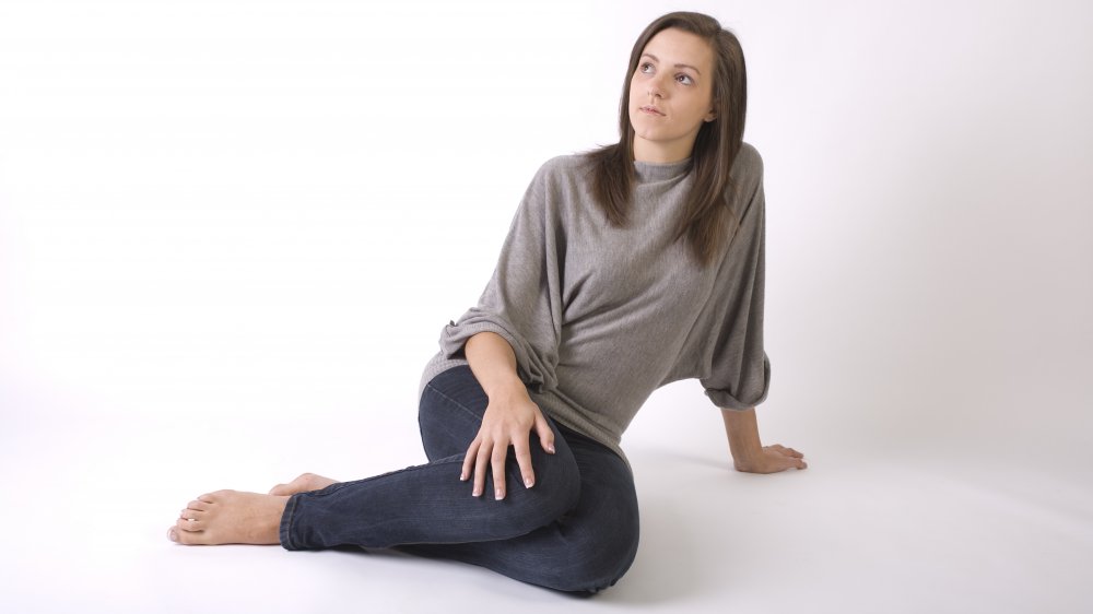 woman in a baggy sweater