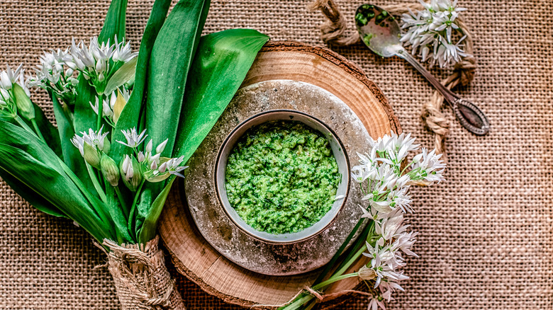 bowl of pesto with flowers