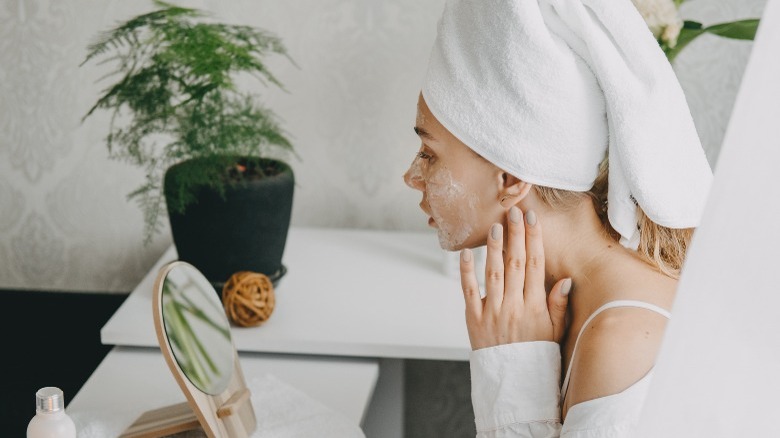 Woman with cream on face