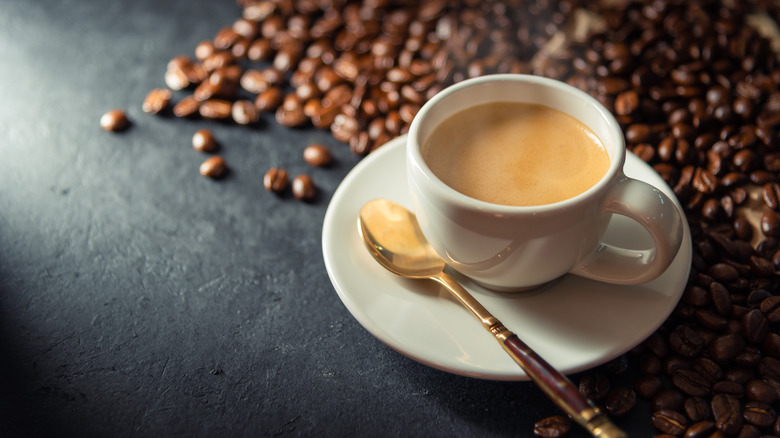 Coffee beans and a mug