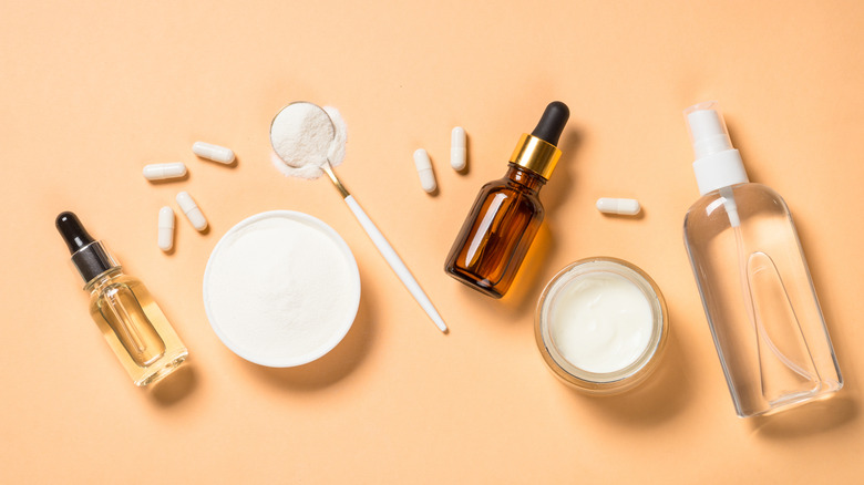 bottles of unlabeled pills, liquids, and creams 