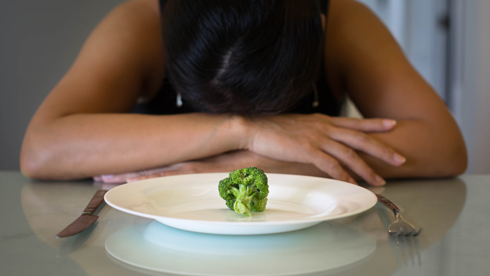 Stalk of broccoli on plate