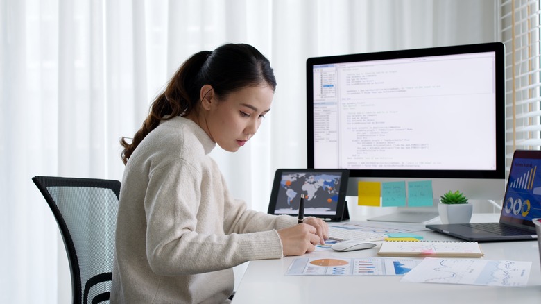 A woman working from a home office. 