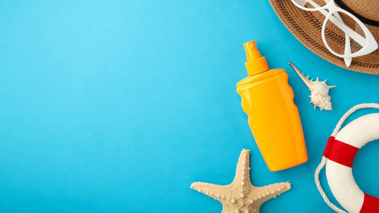 Beach items including sunscreen